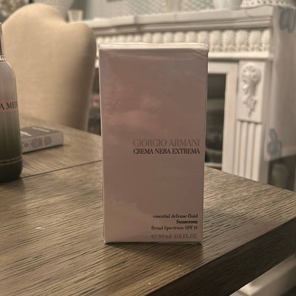 Giorgio Armani Crema Nera Extrema essential defense fluid sunscreen SPF 14